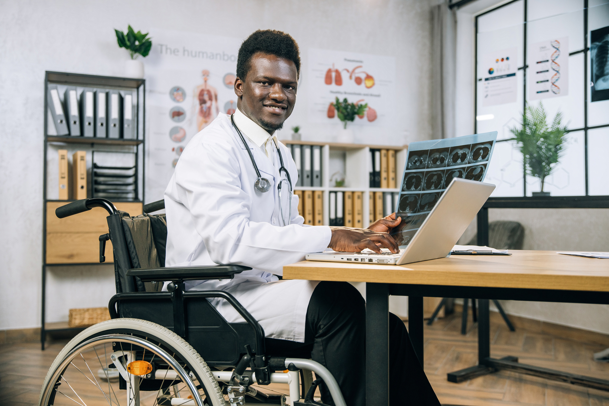 doctor with disability smiling on camera