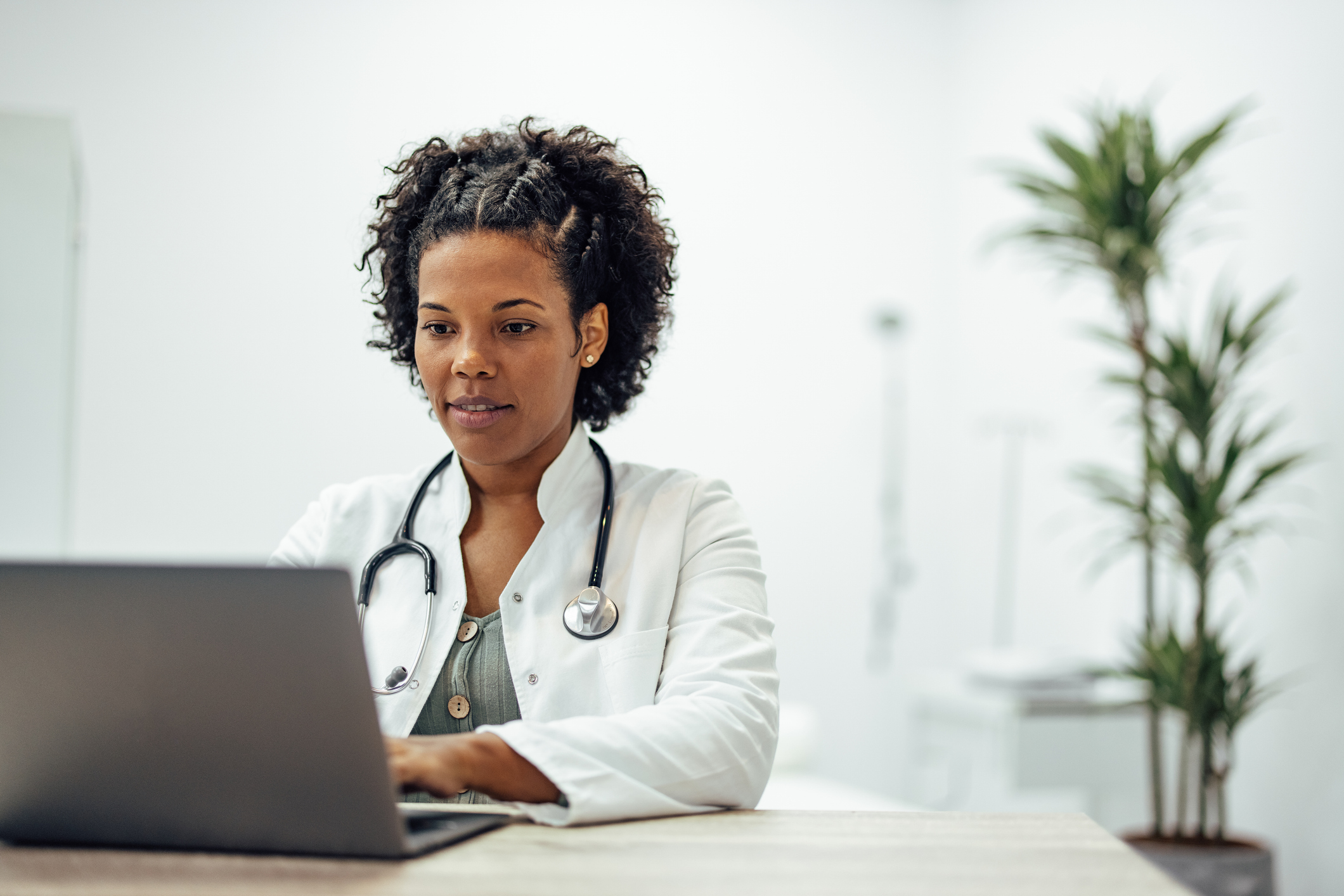 physician at computer